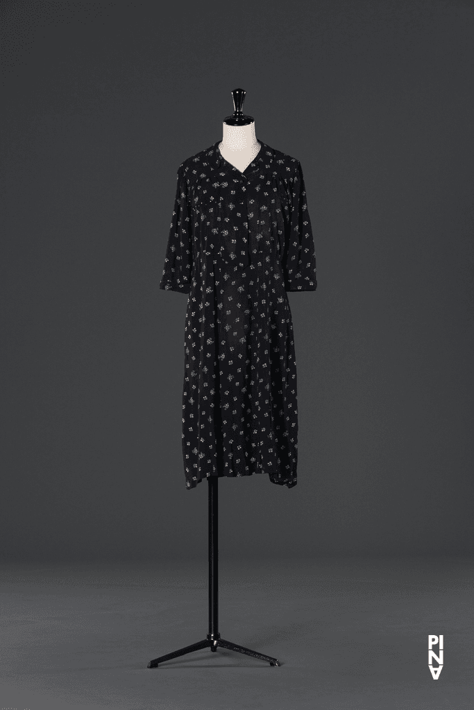 Short dress and shirt worn by Malou Airaudo in “Adagio – Five Songs by Gustav Mahler” by Pina Bausch