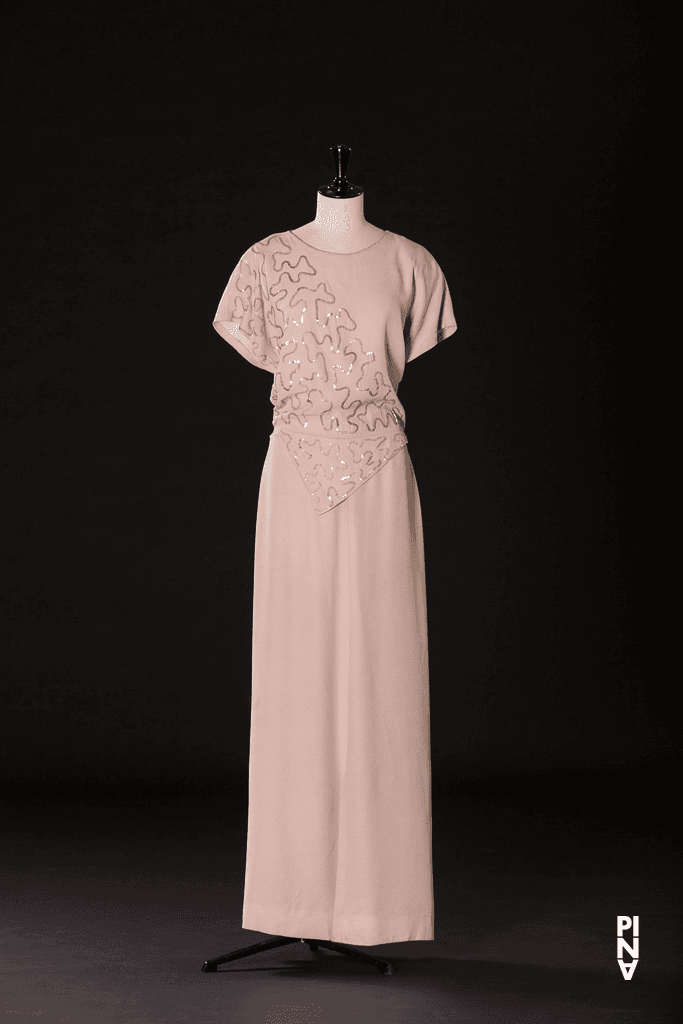 Long dress worn by Anne Martin and Héléna Pikon in “Nelken (Carnations)” by Pina Bausch