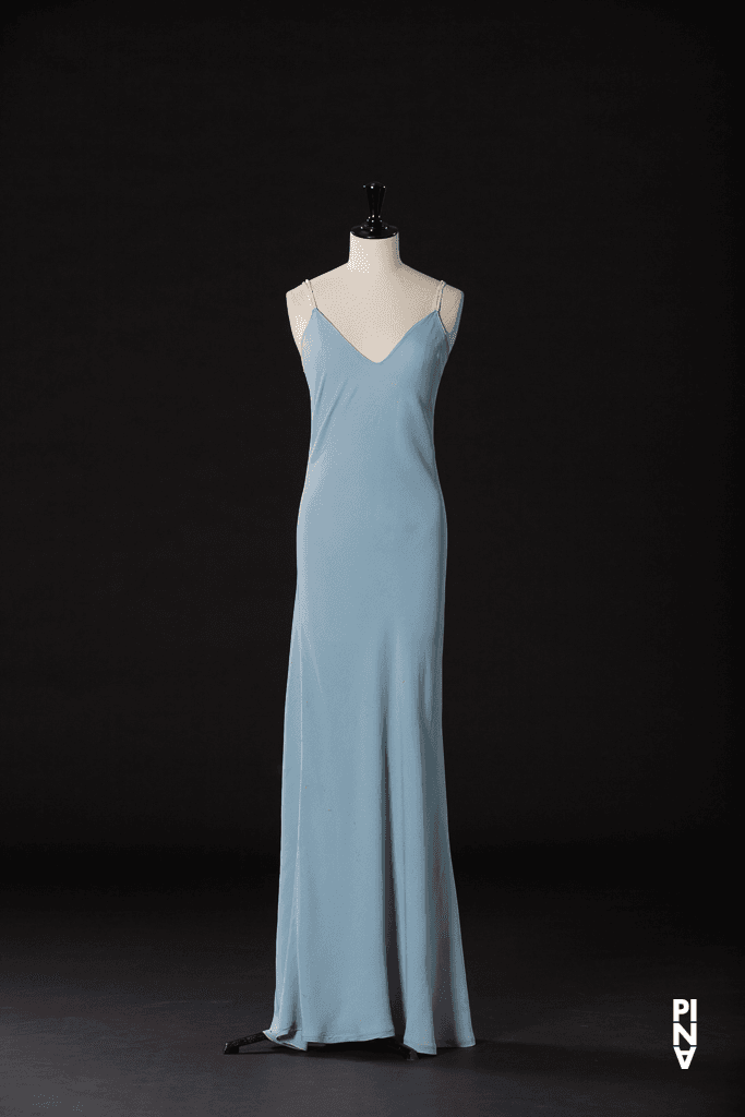 Long dress worn by Héléna Pikon in “Nelken (Carnations)” by Pina Bausch