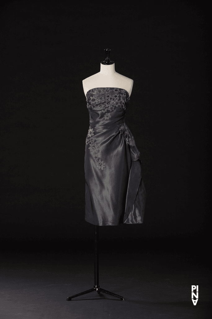 Short dress worn by Héléna Pikon in “Nelken (Carnations)” by Pina Bausch