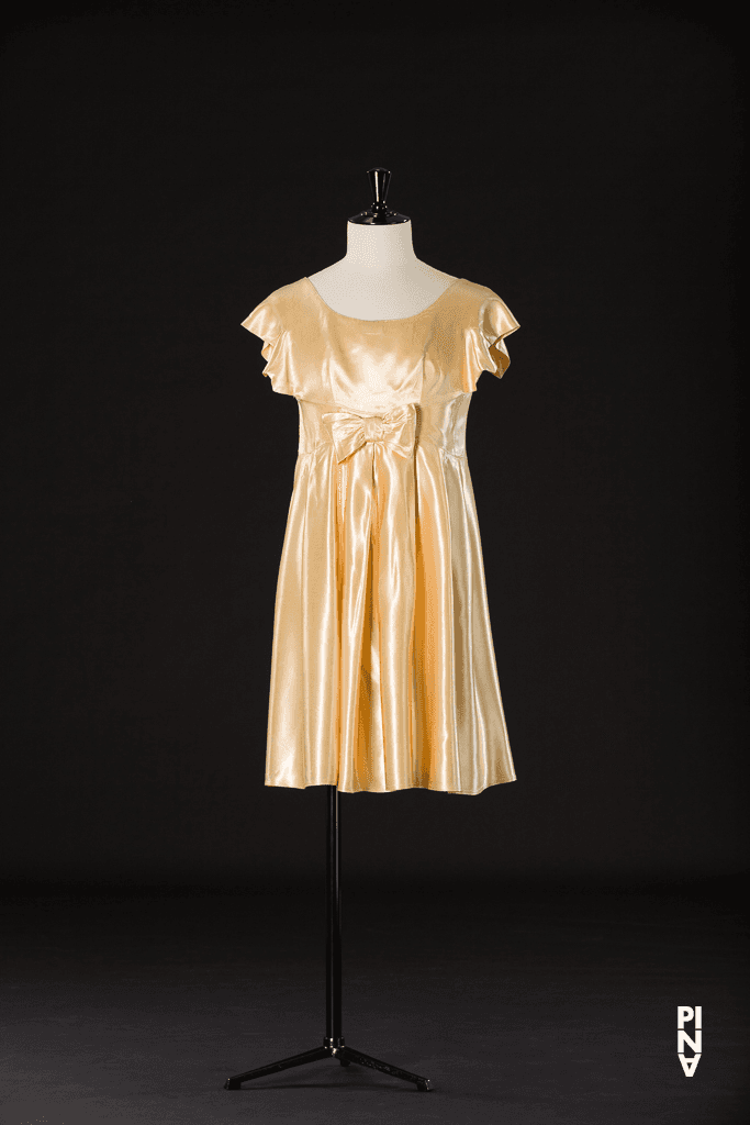 Short dress worn by Lutz  Förster in “Nelken (Carnations)” by Pina Bausch